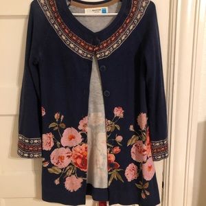 Cute sweater with floral print on bottom